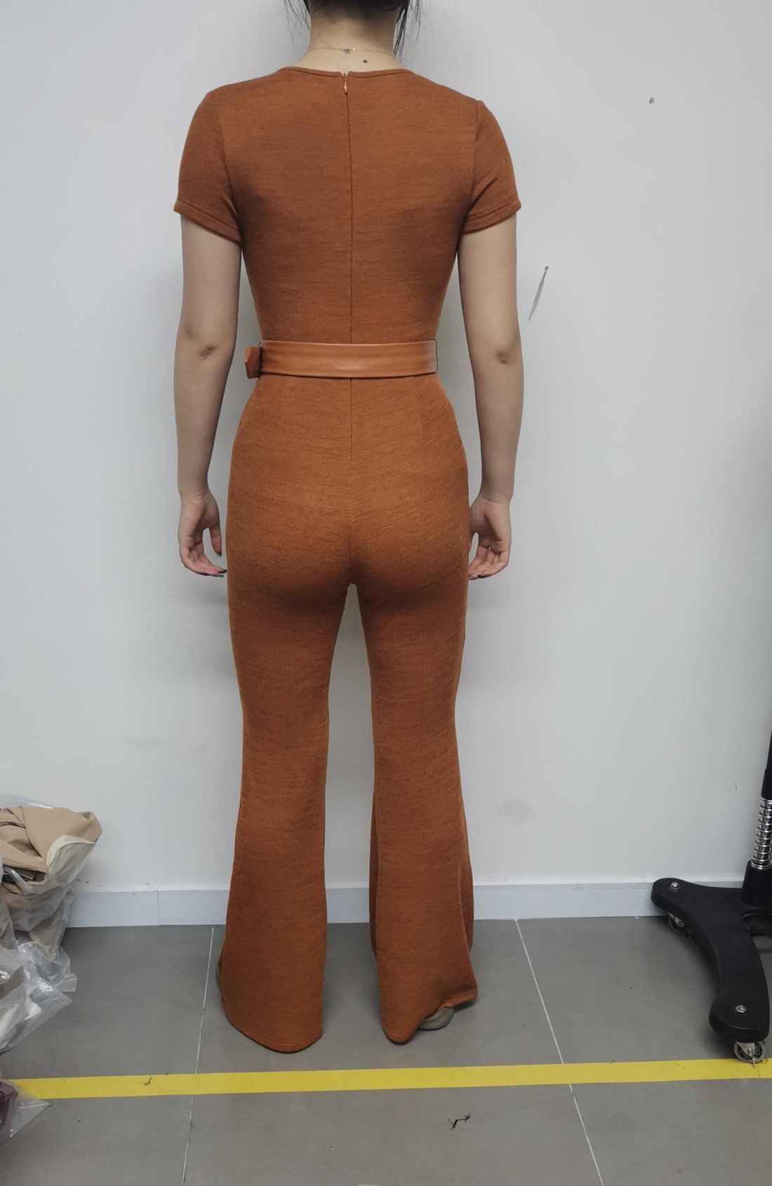 Ribbed knit top and flare trouser set with belt, back view