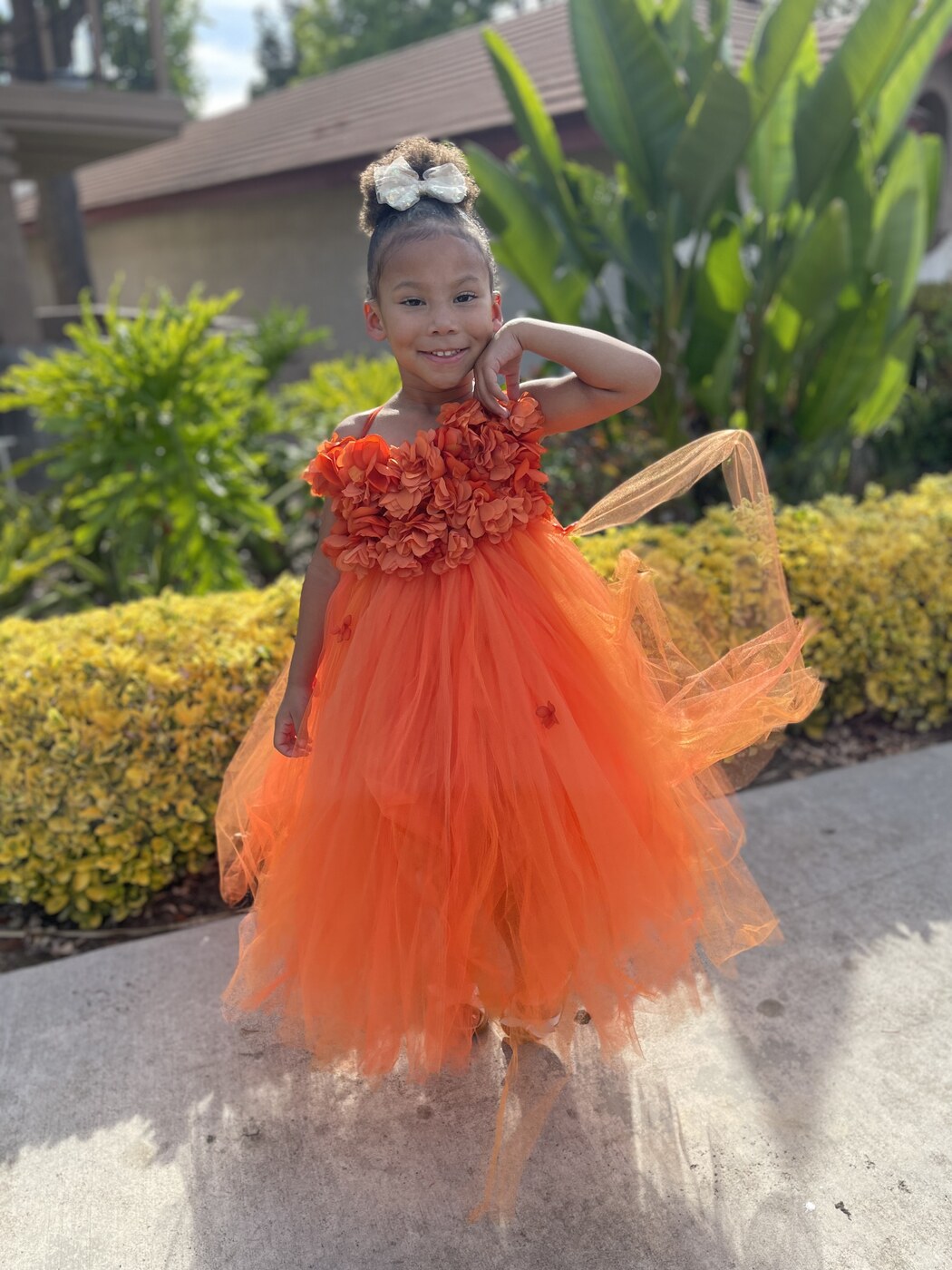 Custom orange tulle party dress with floral bodice
